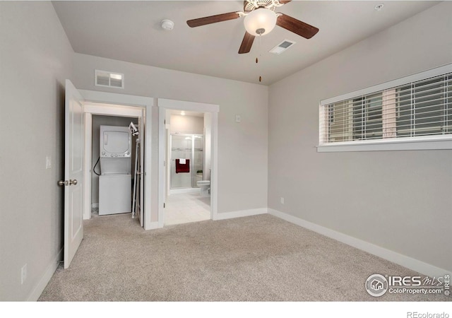 unfurnished bedroom featuring baseboards, visible vents, and carpet floors