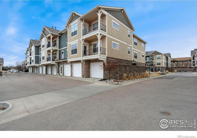 view of property with a residential view