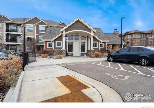 view of building exterior with a residential view