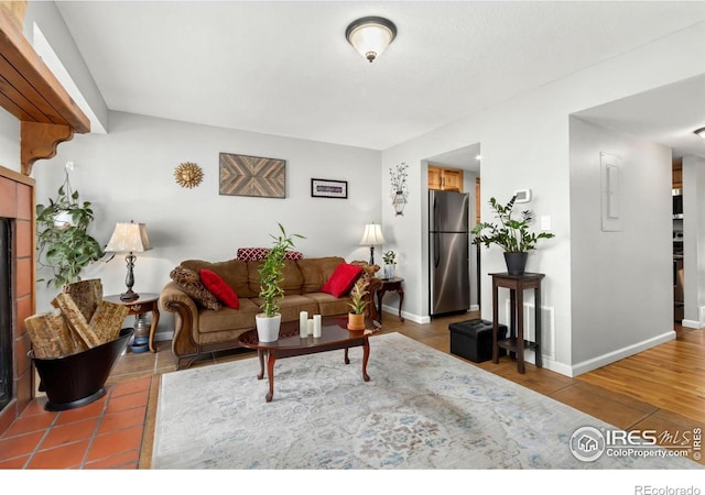 living room with visible vents and baseboards