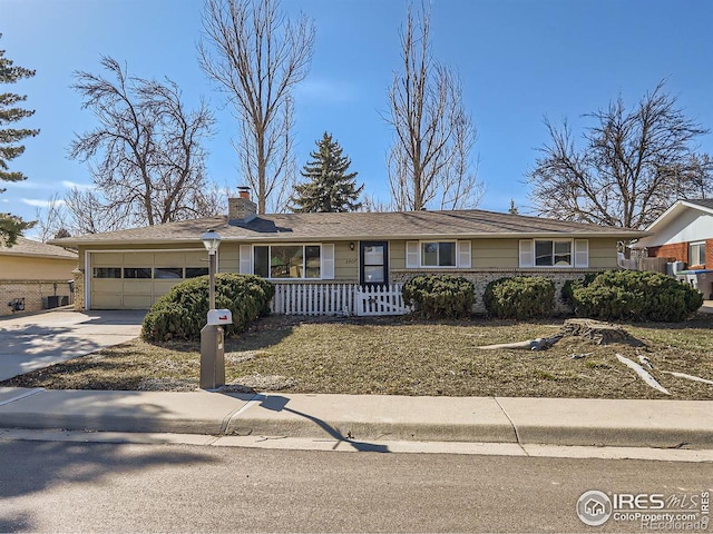 ranch-style house with driveway, a chimney, a garage, and fence