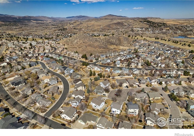 bird's eye view with a mountain view and a residential view