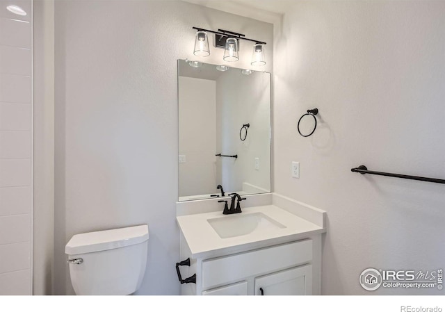1685 Crystalline Dr, Windsor, CO 80550 - bathroom featuring toilet and vanity