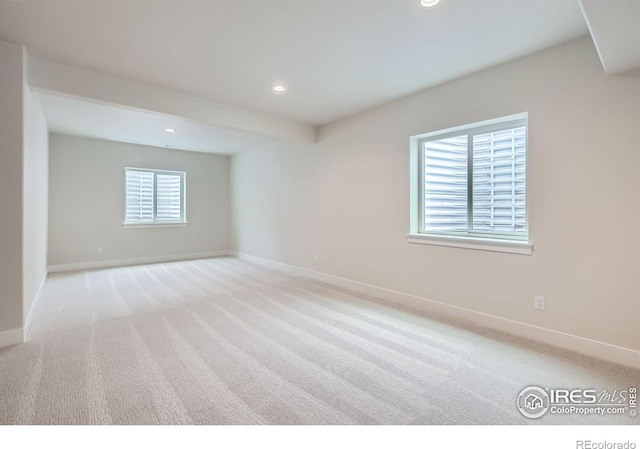 1685 Crystalline Dr, Windsor, CO 80550 - spare room with recessed lighting, baseboards, and carpet floors