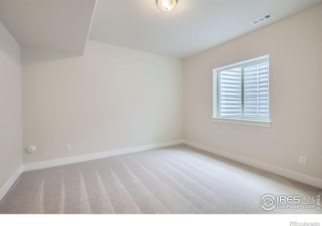1685 Crystalline Dr, Windsor, CO 80550 - carpeted empty room with visible vents and baseboards