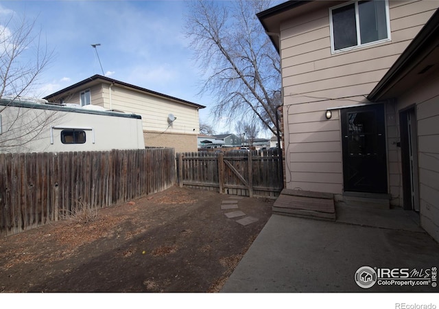 1351 Emery St, Longmont, CO 80501 - view of yard featuring a fenced backyard