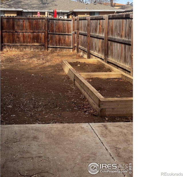 1351 Emery St, Longmont, CO 80501 - entry to storm shelter featuring fence