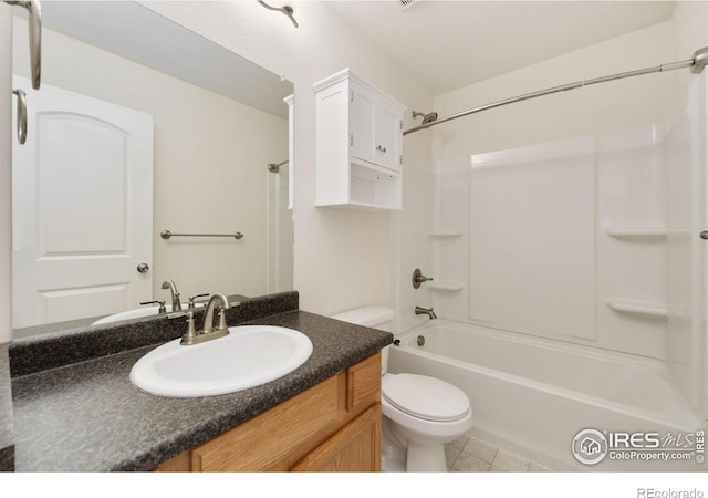 full bathroom with tile patterned flooring, toilet, vanity, and bathing tub / shower combination