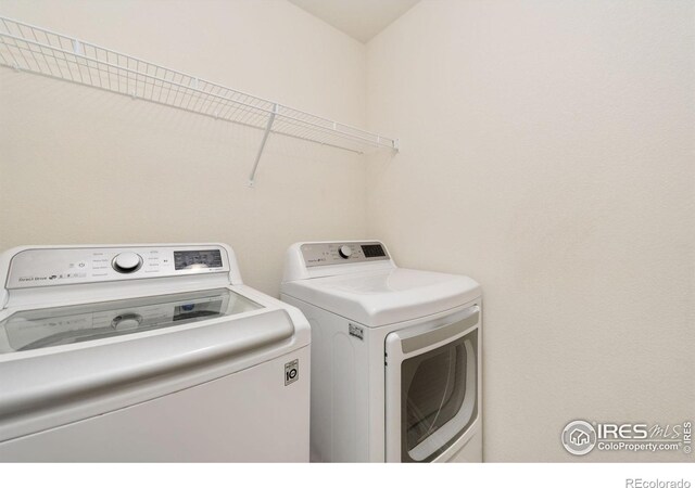 laundry room with laundry area and washer and dryer