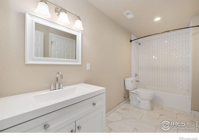 bathroom featuring visible vents, toilet, bathing tub / shower combination, marble finish floor, and vanity