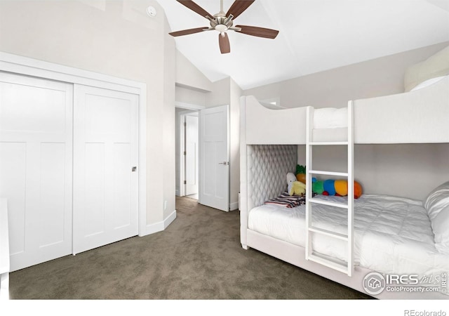 unfurnished bedroom featuring a ceiling fan, baseboards, high vaulted ceiling, a closet, and carpet flooring