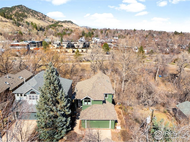 drone / aerial view with a mountain view and a residential view