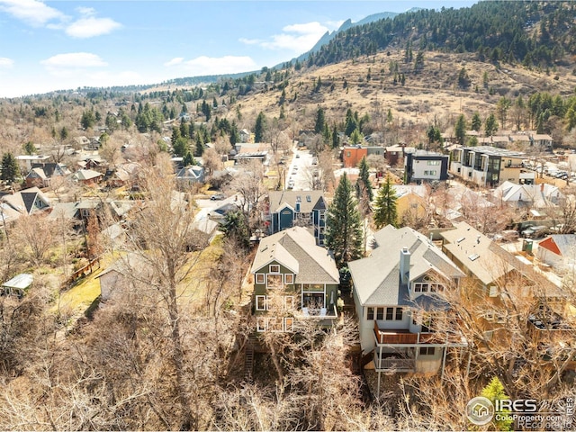 bird's eye view featuring a residential view and a mountain view