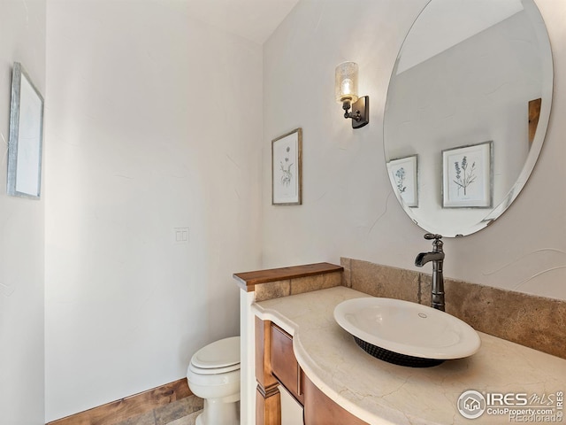 half bath with toilet and vanity