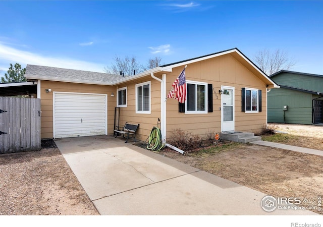 view of front of house featuring an attached garage and driveway