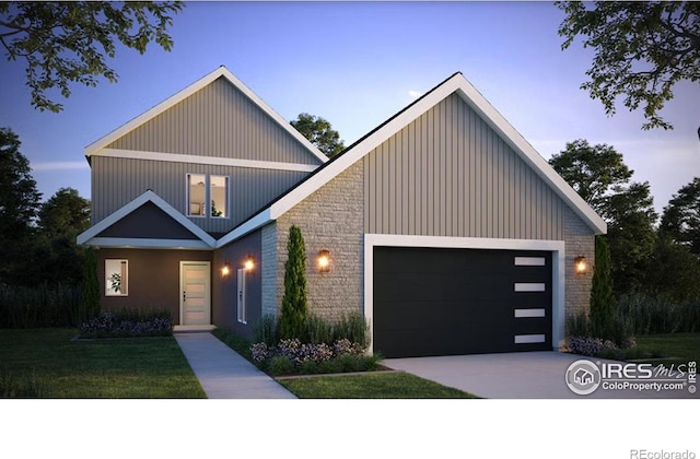 view of front of house with a garage, a front yard, brick siding, and driveway