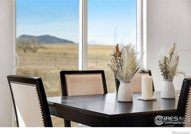 dining room with a mountain view