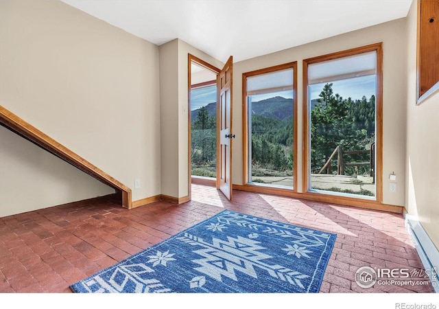 15 Golden Age Rd, Jamestown, CO 80455 - doorway to outside with brick floors and plenty of natural light