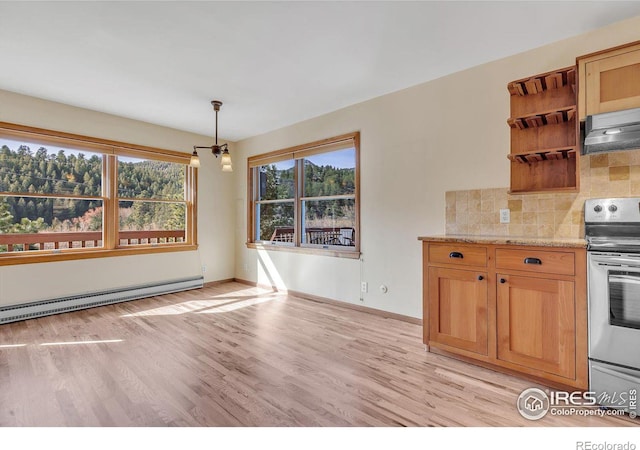 15 Golden Age Rd, Jamestown, CO 80455 - kitchen with stainless steel electric range, baseboard heating, light wood-style flooring, tasteful backsplash, and pendant lighting