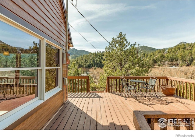15 Golden Age Rd, Jamestown, CO 80455 - deck with a mountain view and outdoor dining space