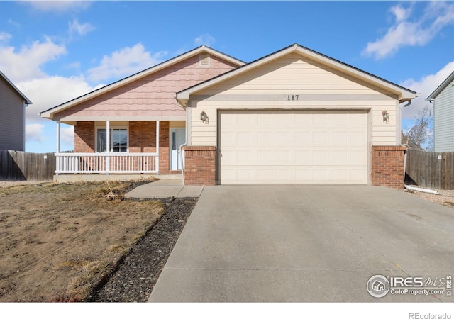 ranch-style house featuring brick siding, concrete driveway, an attached garage, and fence