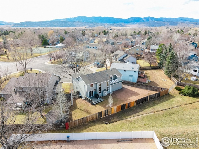 drone / aerial view with a mountain view and a residential view