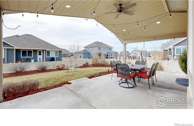 1386 Plains Ct, Eaton, CO 80615 - view of patio with outdoor dining area, a residential view, fence private yard, and ceiling fan