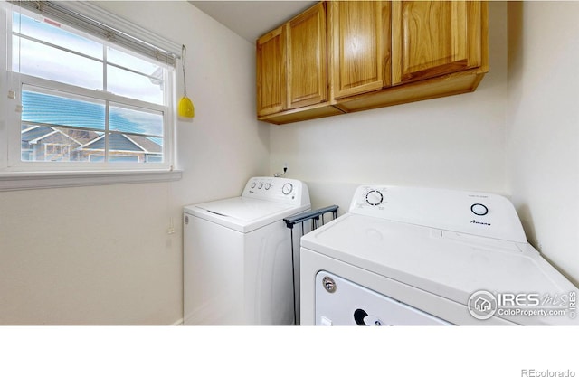 1386 Plains Ct, Eaton, CO 80615 - clothes washing area featuring washer and dryer and cabinet space