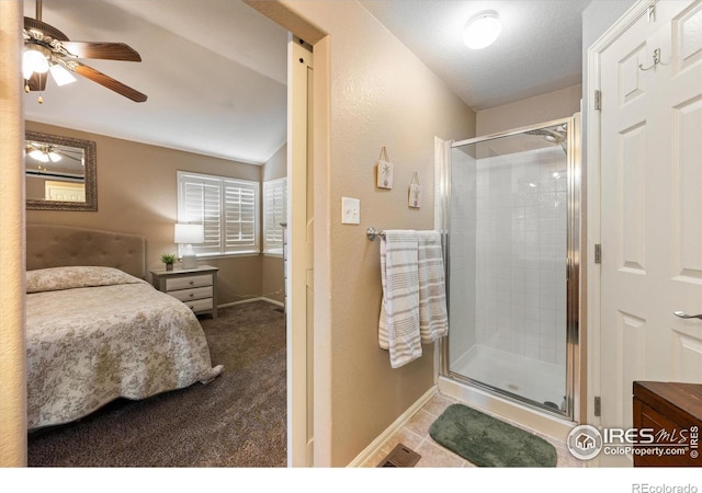 full bathroom with visible vents, baseboards, a ceiling fan, and a shower stall