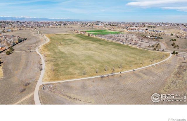 birds eye view of property featuring a rural view and a mountain view