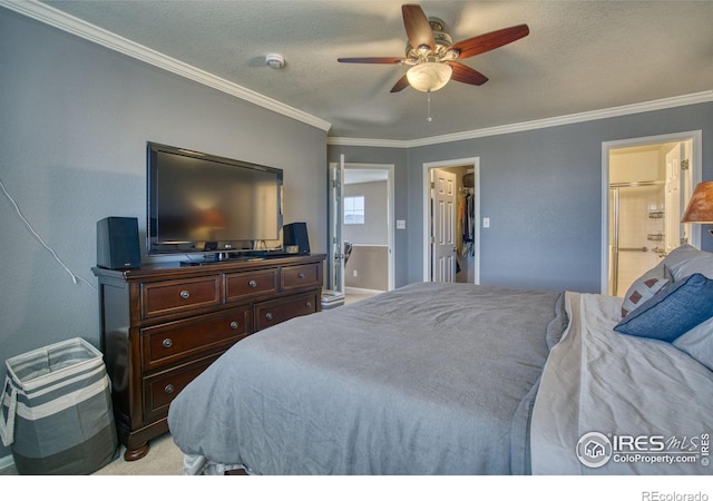 bedroom with light colored carpet, a textured ceiling, ceiling fan, and ornamental molding