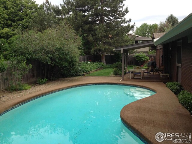 325 Fox Ct, Boulder, CO 80303 - view of swimming pool with a fenced backyard and a patio area