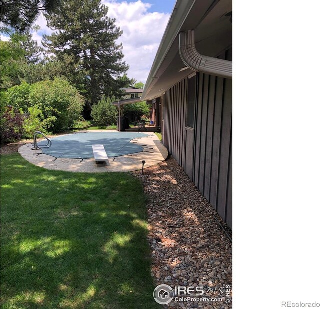 325 Fox Ct, Boulder, CO 80303 - view of green lawn with a patio area