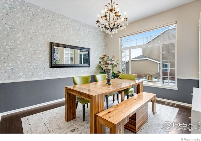 2073 River W Dr, Windsor, CO 80550 - dining room with plenty of natural light, baseboards, and a chandelier