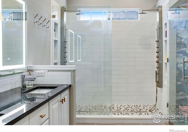 2073 River W Dr, Windsor, CO 80550 - full bathroom with vanity and a stall shower