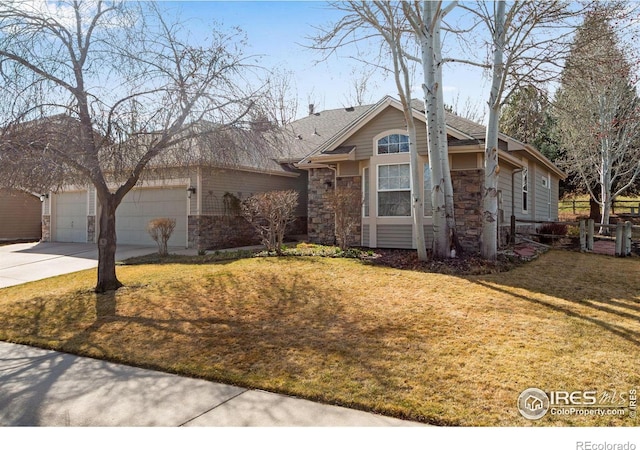 2073 River W Dr, Windsor, CO 80550 - single story home featuring driveway, stone siding, roof with shingles, a front yard, and a garage