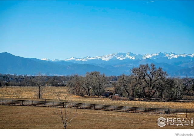 property view of mountains featuring a rural view