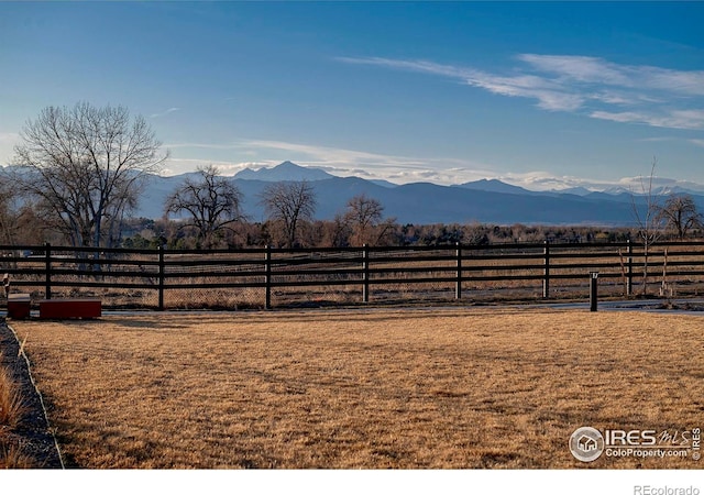 property view of mountains featuring a rural view