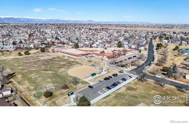 birds eye view of property with a residential view and a mountain view