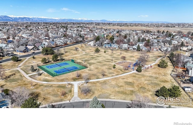 aerial view featuring a mountain view and a residential view