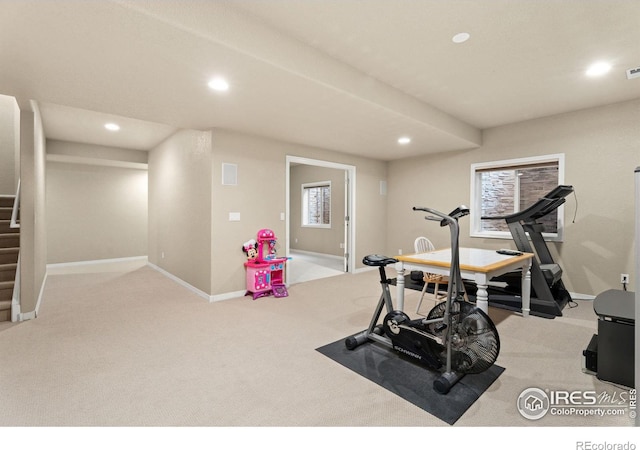 exercise area with recessed lighting, baseboards, and carpet floors