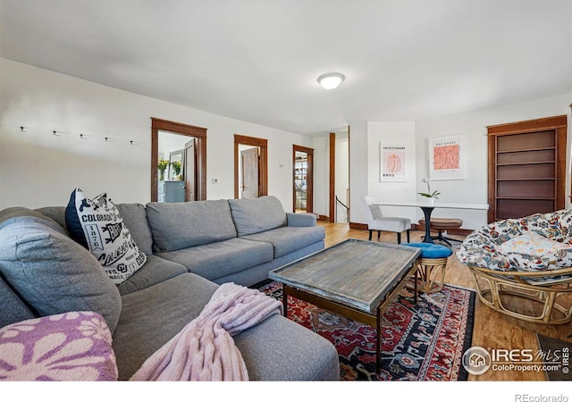 living area with wood finished floors