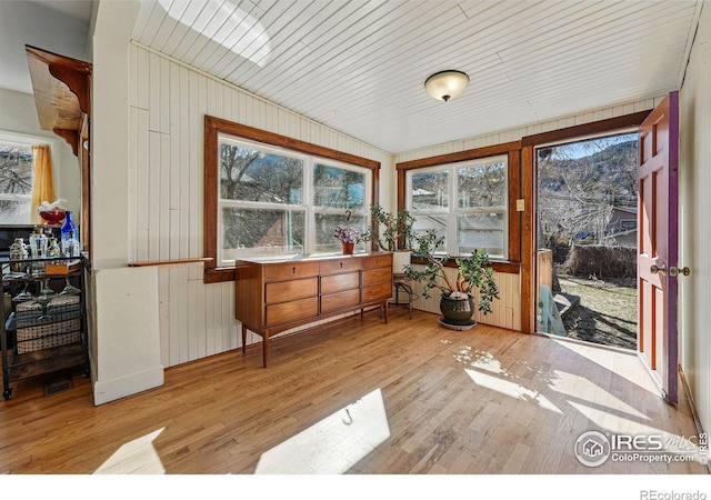 sunroom / solarium featuring plenty of natural light