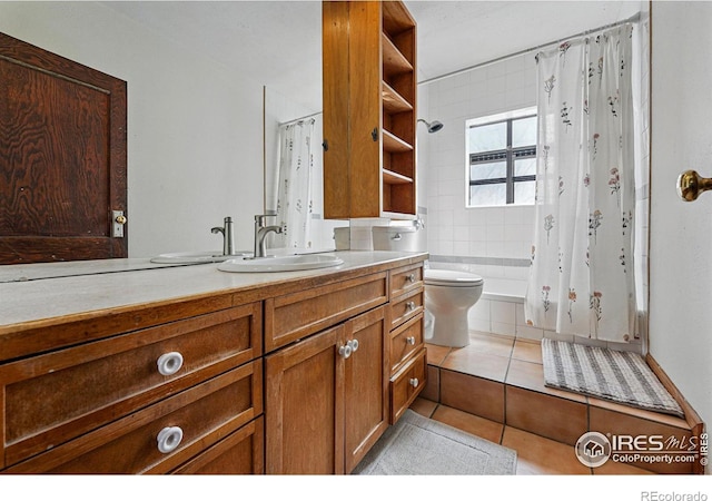 full bathroom featuring tile patterned floors, shower / bathtub combination with curtain, toilet, and vanity