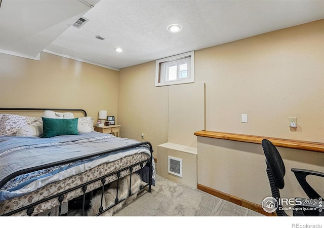 carpeted bedroom with recessed lighting, visible vents, and a textured ceiling