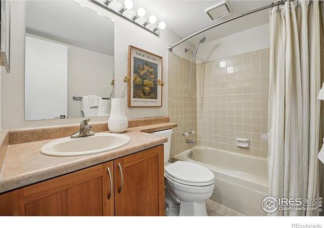 bathroom with vanity, toilet, and shower / bath combo