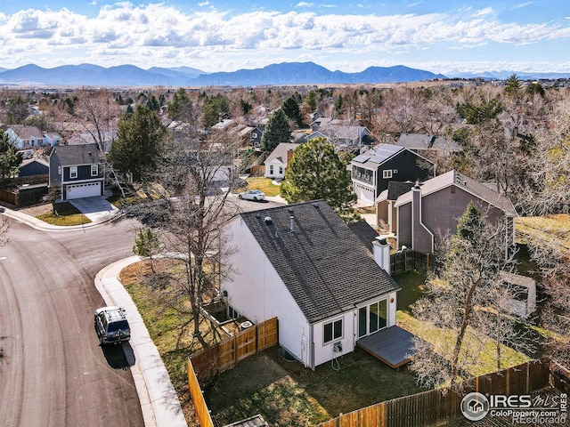 drone / aerial view with a residential view and a mountain view