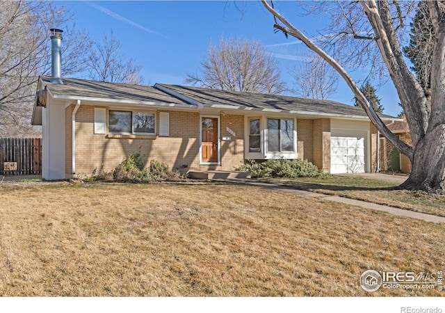 ranch-style house with a front lawn, an attached garage, fence, and brick siding