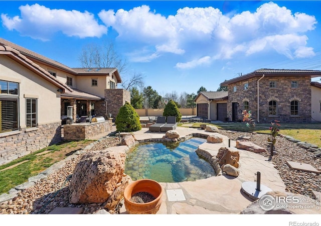 1652 Poplar Ave, Boulder, CO 80304 - view of pool with an outdoor kitchen and a patio area