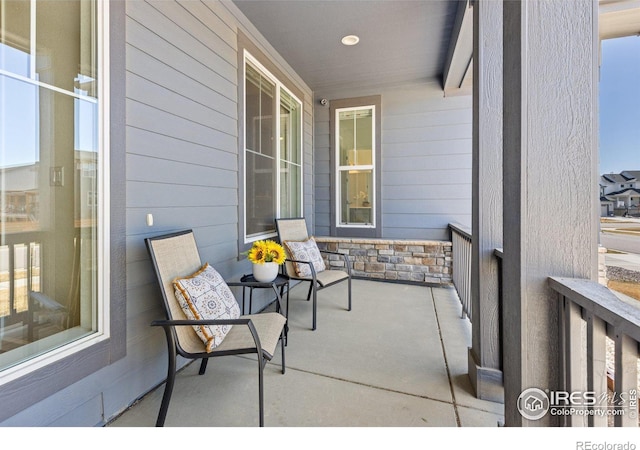 balcony featuring a porch